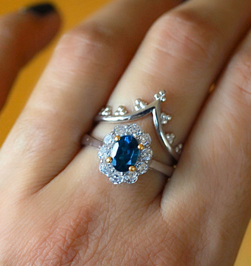 Oval gemstone duchess ring