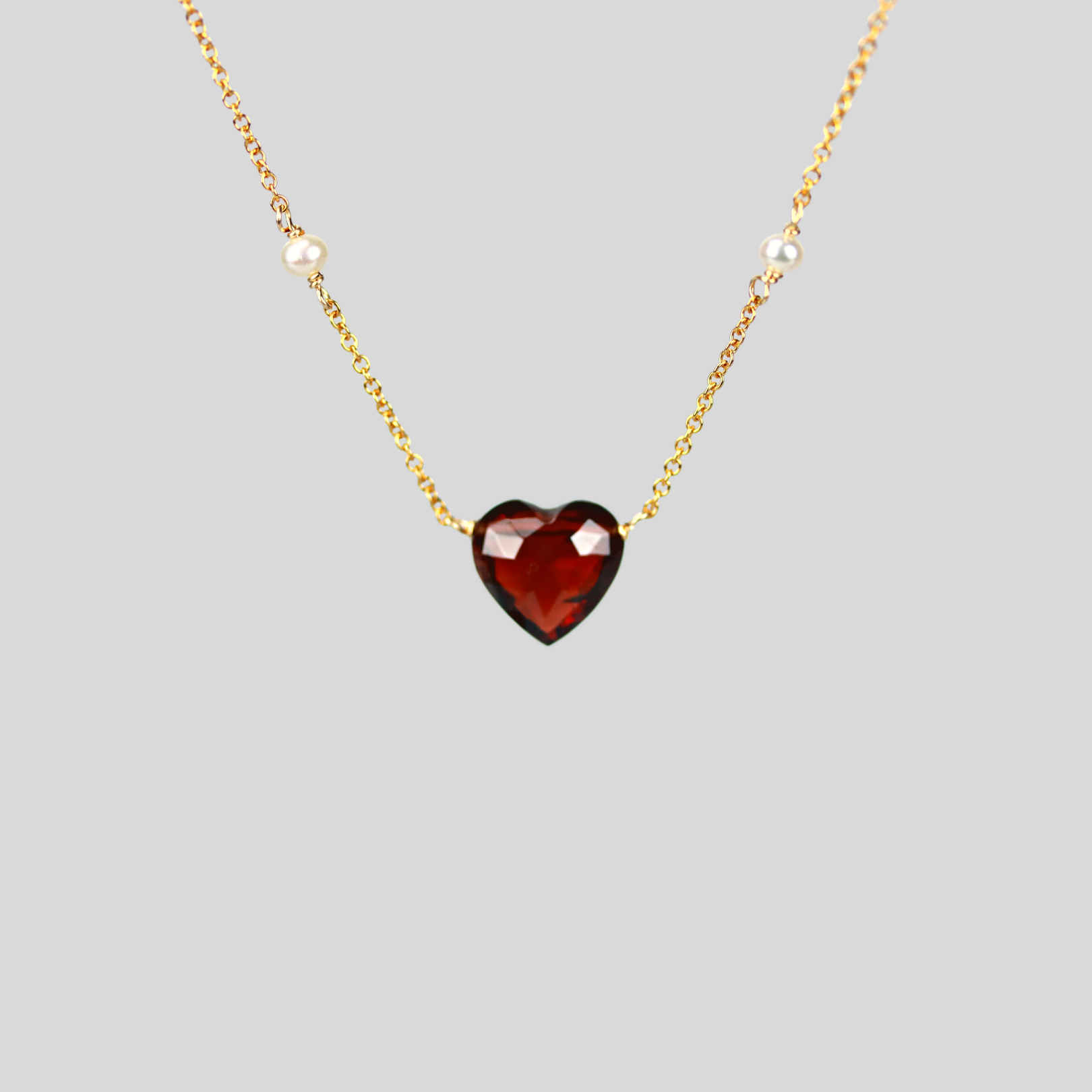 Garnet heart necklace with seed pearls