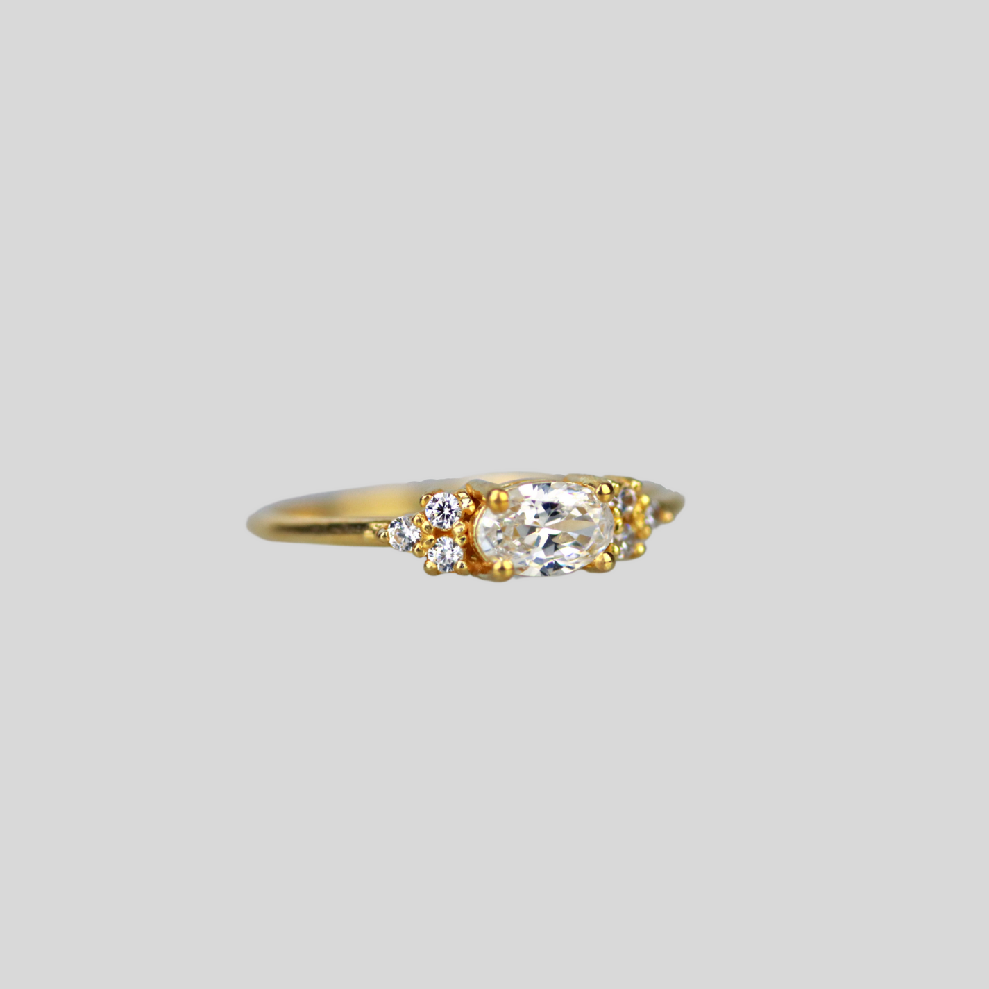 Solid 14k gold east-west oval cz ring