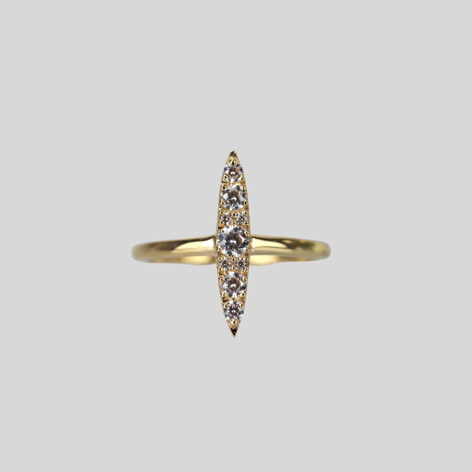 Solid 14k gold sleek navette ring in cubic zirconia