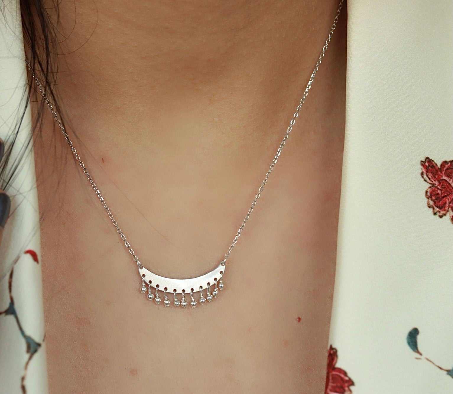 Dangling silver beads moon necklace