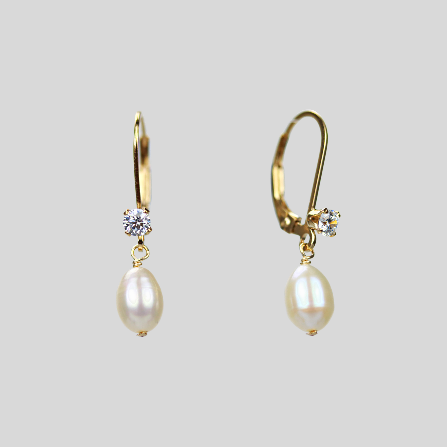 Dangling pearl teardrop earrings