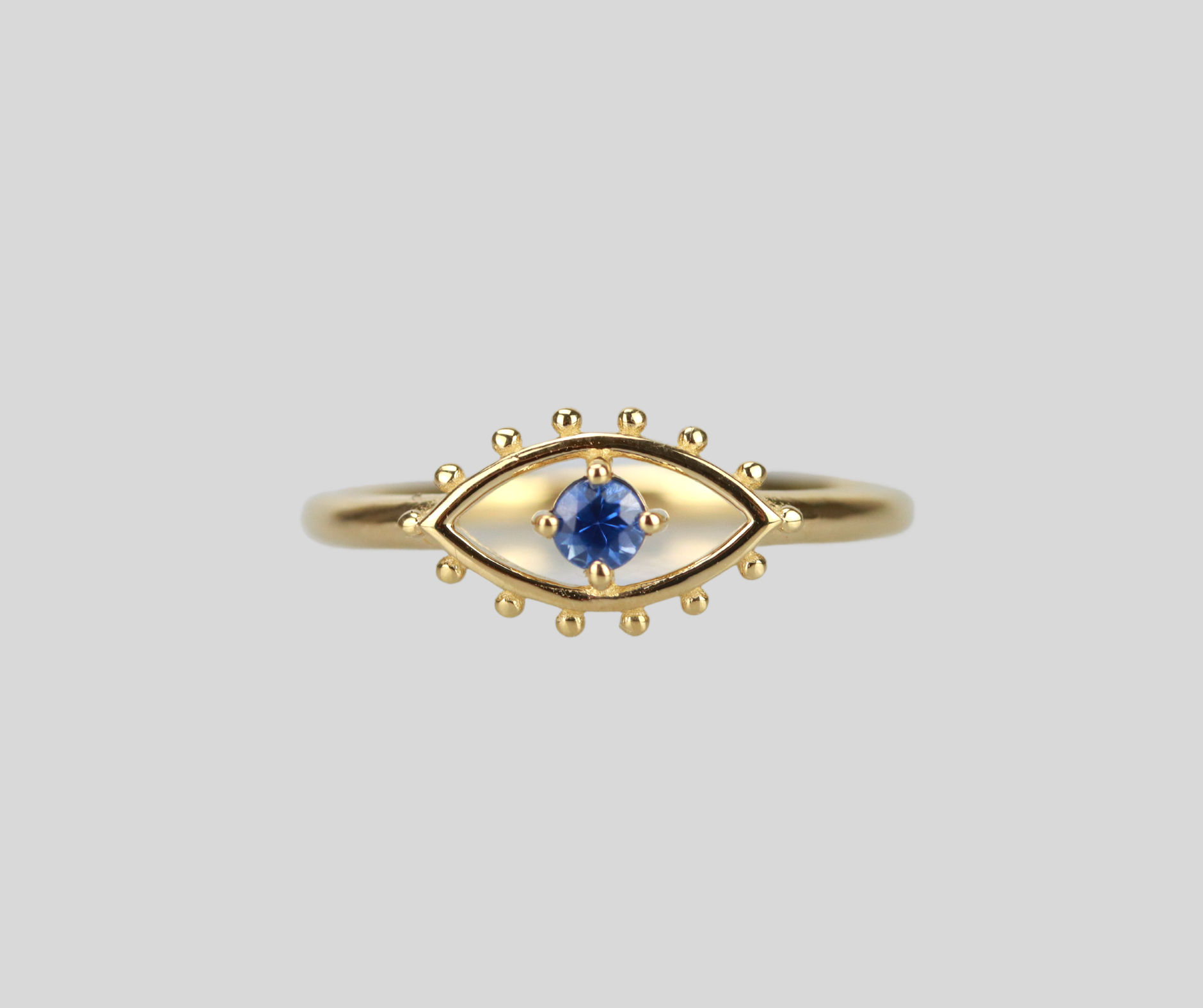 Solid 14k Gold Prosperity Eye Ring in Ble Sapphire