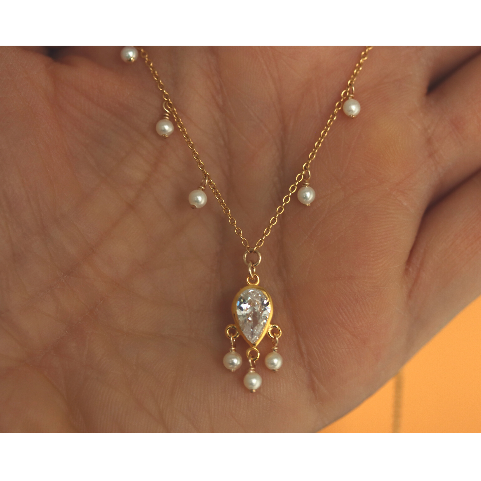 Teardrop necklace with seed pearls