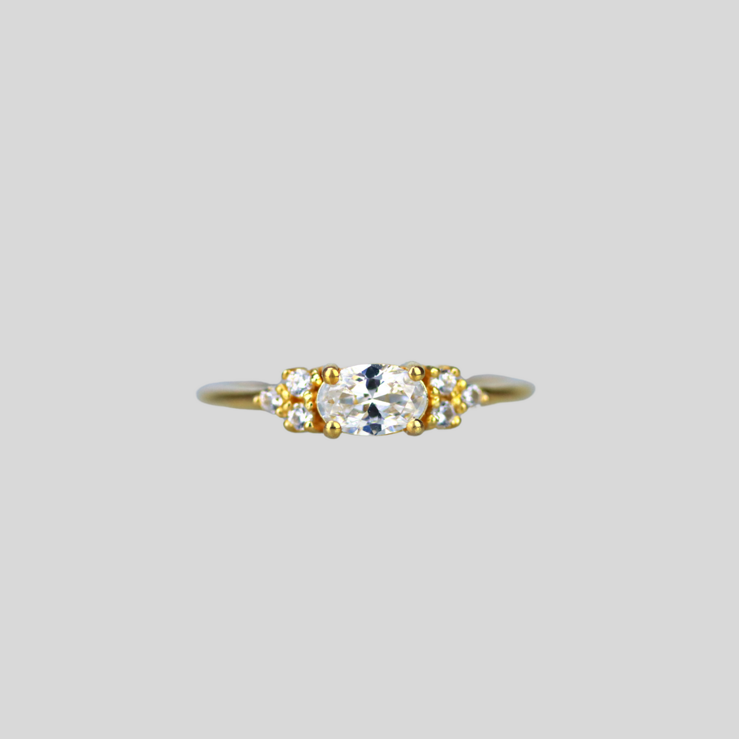 Solid 14k gold east-west oval cz ring