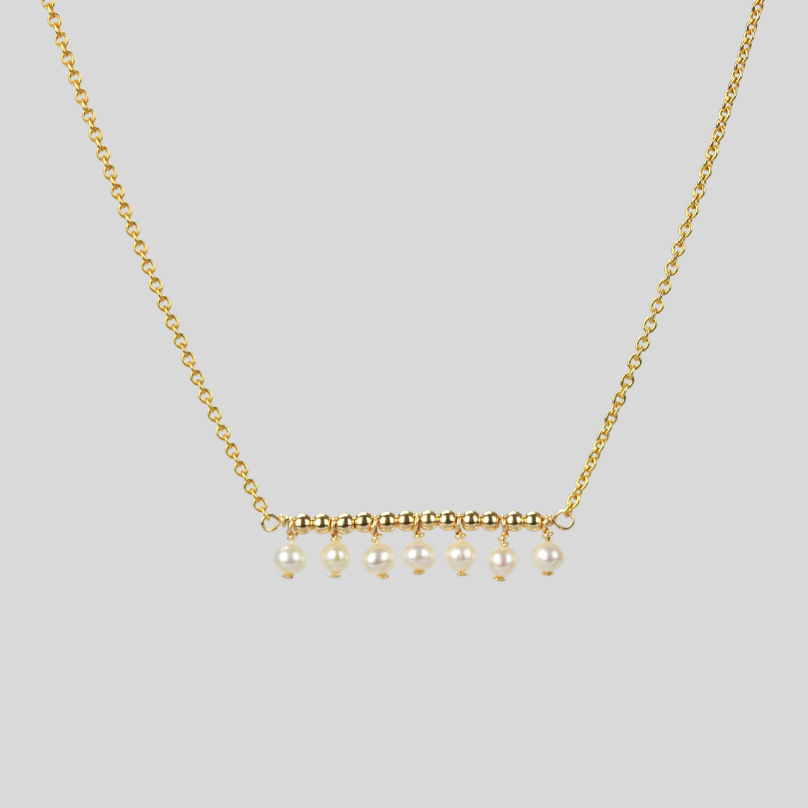 Dangling seed pearls bar necklace