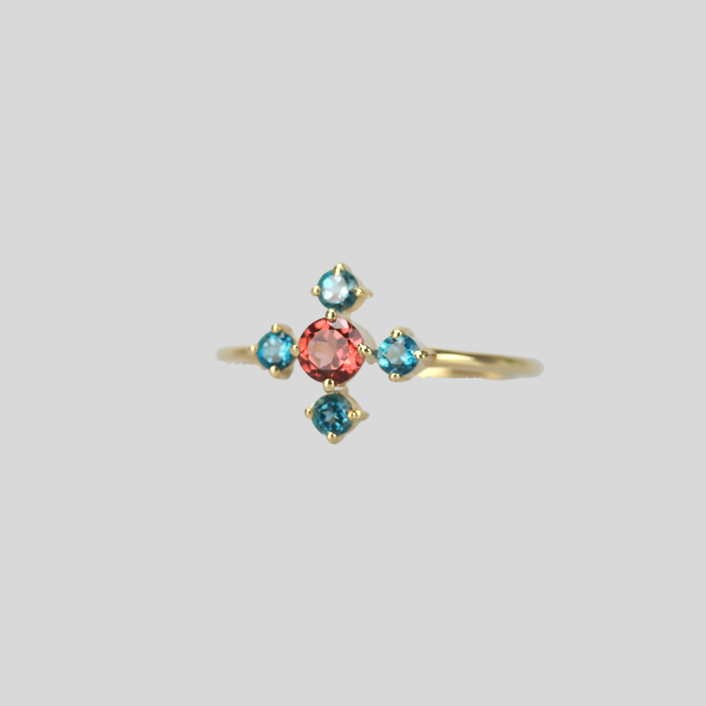 Solid 14k gold twinkling flower ring with garnet and london topaz