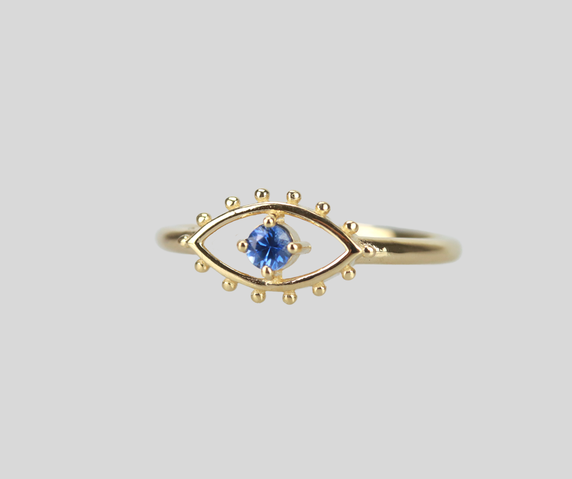 Solid 14k Gold Prosperity Eye Ring in Ble Sapphire