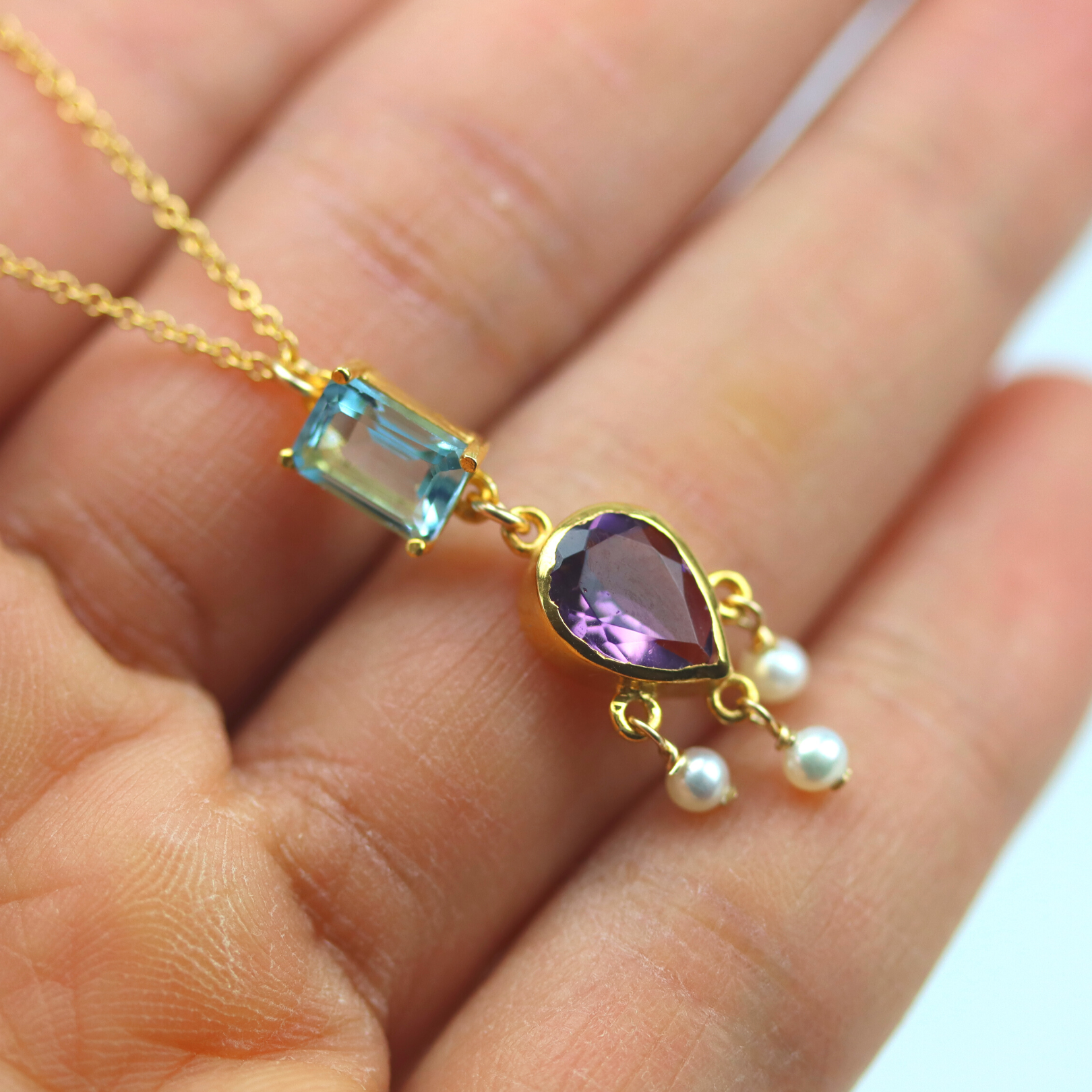 Teardrop amethyst and blue topaz necklace